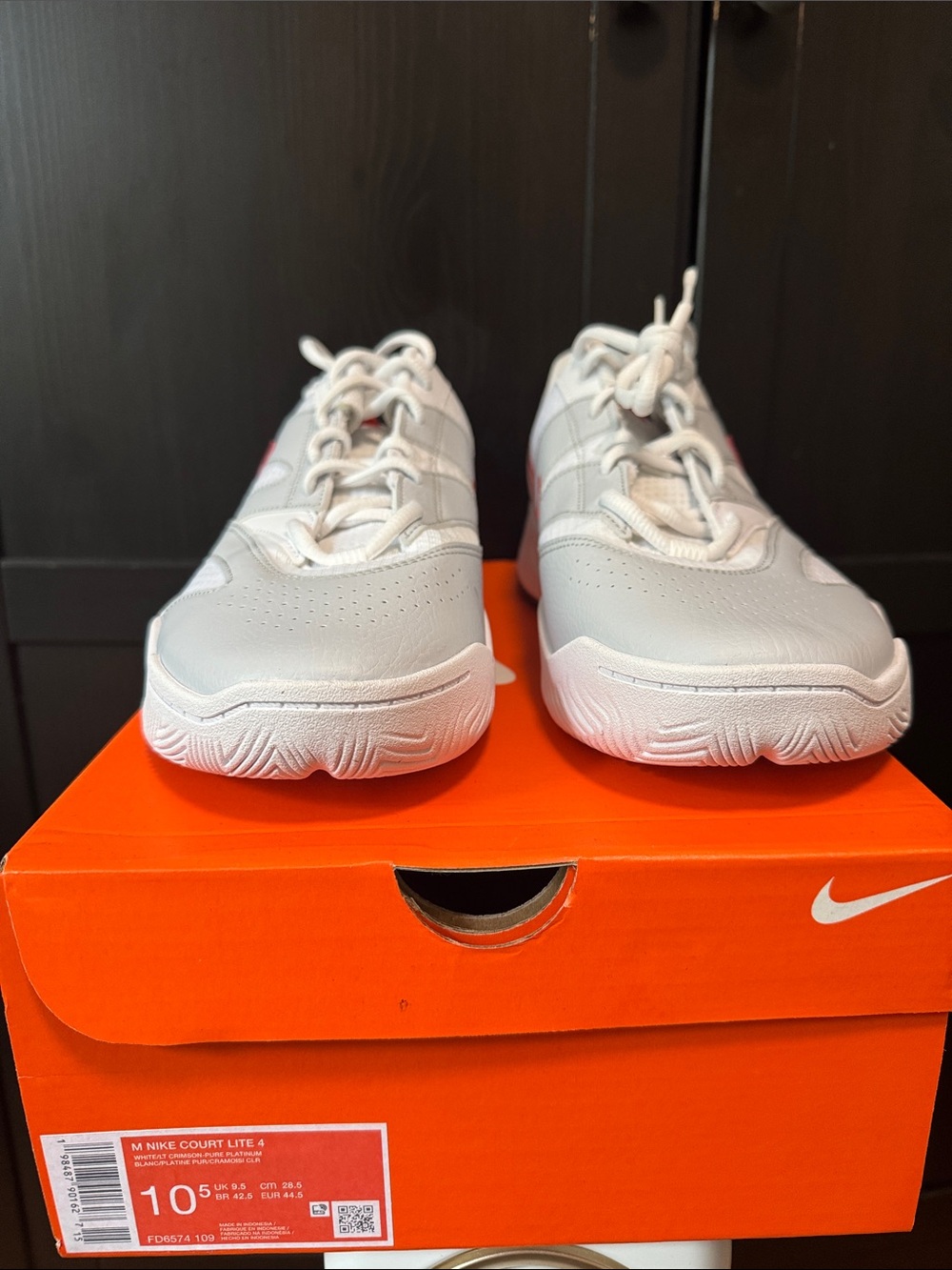 Nike White Tennis Shoes with Red Accents